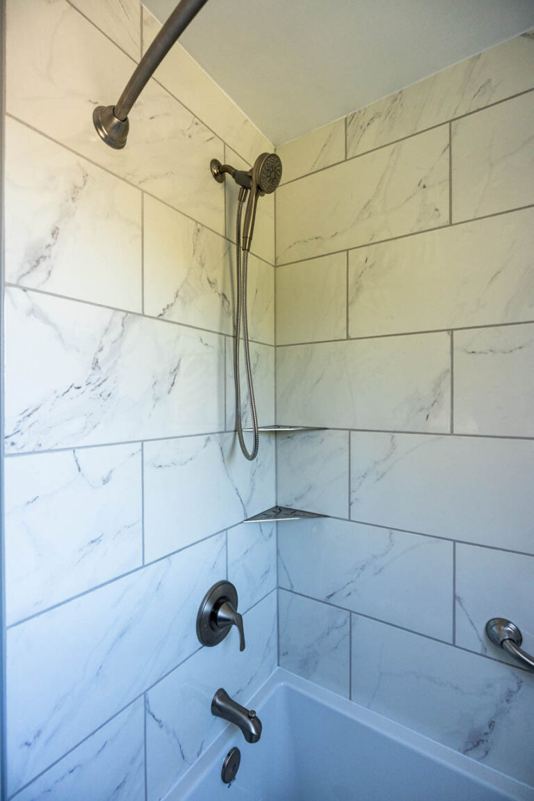 bathroom renovation contractors of Ottawa detailed tiled work with Schluter shower shelves