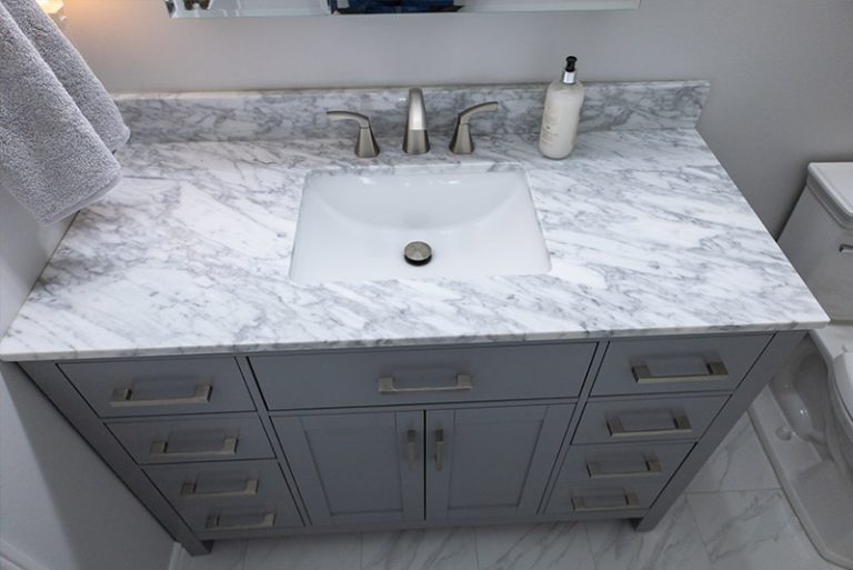 vanity with marble counter top in kanata bathroom