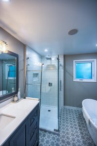 Full Bathroom renovation Shower with Subway tiles free standing tub tiled floor Schluter Systems