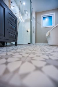 Full Bathroom renovation tiled floor Ditra schluter subway tile shower free standing tub