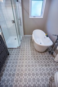 Ottawa Bathroom reno Tiled flooring free standing tub