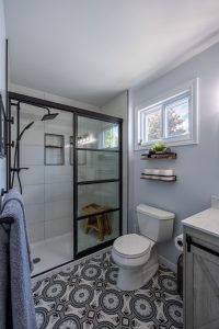 acrylic base tiled walls schluter niche black hardware tiled floor miracle dream homes bathroom renovation 2